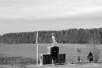 The Memorial to the 101st/506th E-Company in front of the woods they defended during the Battle of the Bulge, Bastogne 1945.