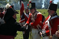 Tranny receives his promotion to Corporal on the field at Plancenoit 2005. Presented by Wagg to mark the forthcoming marriage of Tranny.